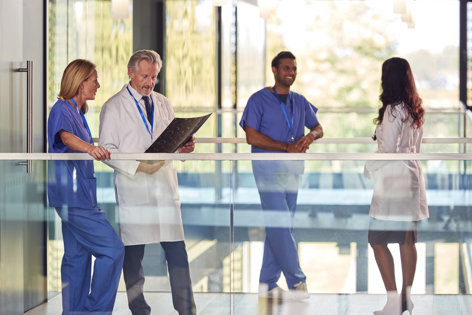Hospital staff in hallway talking